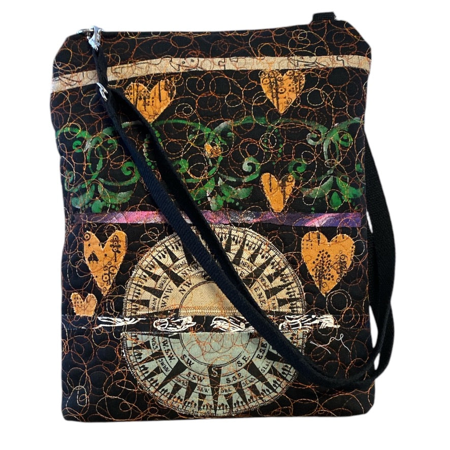 A unique art bag whose fabric is made as a collage of several fabrics and hand-painted