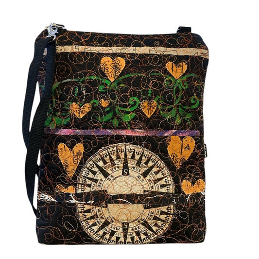 A unique art bag whose fabric is made as a collage of several fabrics and hand-painted