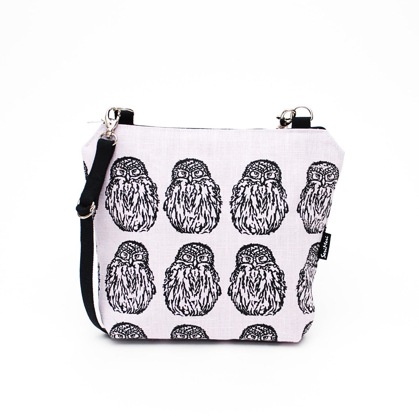 A shoulder bag made of hand-printed linen fabric, owl pattern